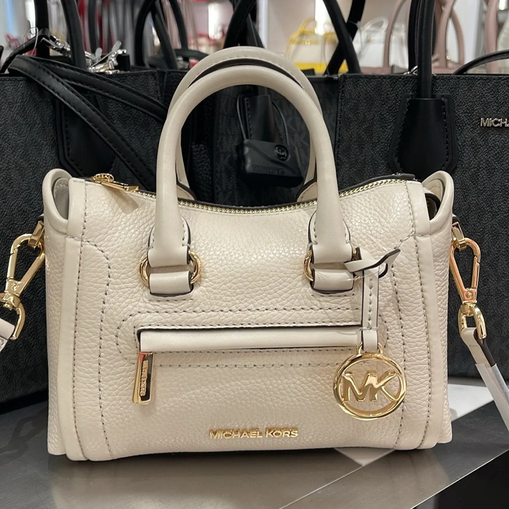 Michael Kors Carine Extra-Small Pebbled Leather Satchel Crossbody 
Light Cream - Picture 12 of 16